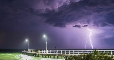 Stunning images capture bizarre and unique storm as sky lights up PURPLE