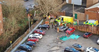 Rescue workers rush to scene after man falls from height into river in Bolton town centre