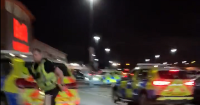 Cops swarm Glasgow Tesco supermarket amid nearby 'bomb scare'