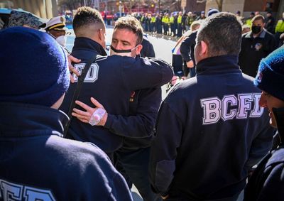 Firefighter hurt in fiery collapse released from hospital