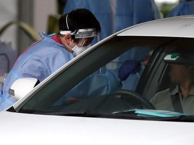Qld records 18 virus deaths, 9974 cases