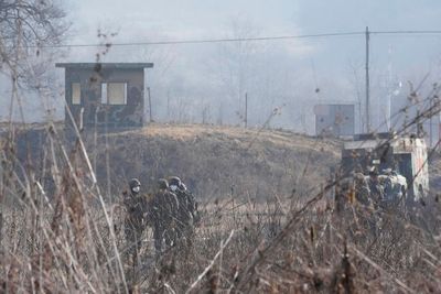 N. Korea confirms missile tests as Kim visits munitions site