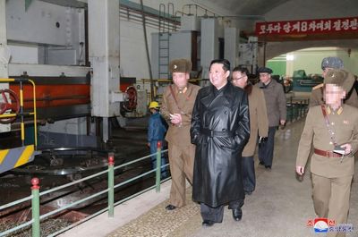 North Korea confirms missile tests as Kim inspects 'important' munitions factory