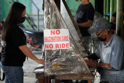 Philippines lifts ban on foreign tourists as outbreak eases