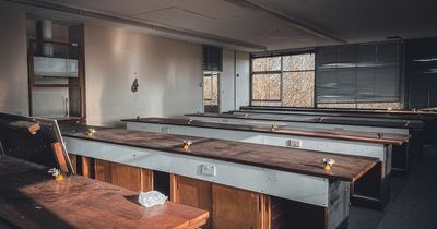 Inside eerie abandoned school with classrooms frozen in time since lessons stopped