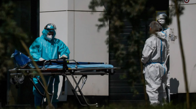 Russia Nears 100,000 Daily Infections as Omicron Rages