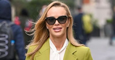 Amanda Holden dresses as a plane pilot as she urges fans to join the 'MH club'