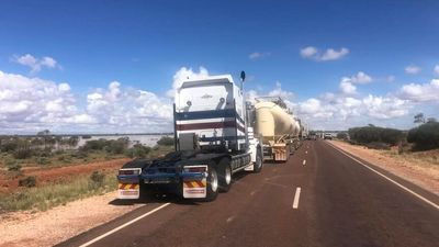 SA's flooded Stuart Highway leaves road-train truckers weighing massive detour to deliver food to NT