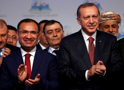 Turkey's Erdogan replaces justice minister, stats institute head