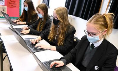 Schools in England reinstate mask wearing rules as Covid cases soar