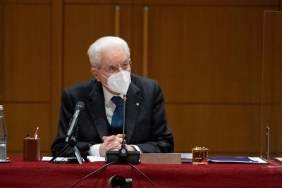 Italy's Mattarella drops retirement plan, stays on as president