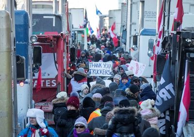 Hundreds of truckers pour into Ottawa to protest vaccine requirements