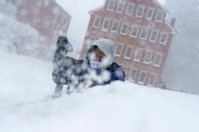 Powerful winter storm hammers northeast setting string of new snowfall records