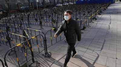 Beijing Seals off More Residential Areas, Reports 12 Cases