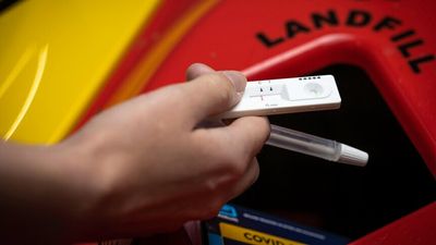 Rapid antigen tests are piling up in homes and offices, but they can't be recycled. Here's why