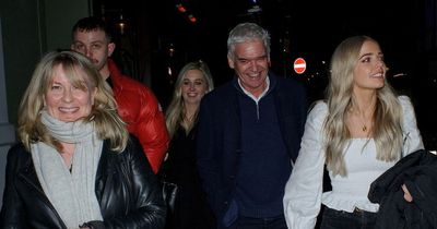 Phillip Schofield beams as he and wife Steph enjoy trip to theatre with daughters