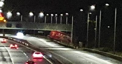 Storm Corrie 'blows HGV through barrier' on M90 as motorway closed