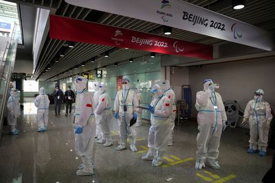 Olympics-COVID cases mount as athletes, personnel arrive in Beijing