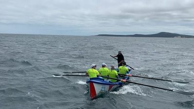 Surfboat rowers complete Bass Strait journey to raise money for Humour Foundation