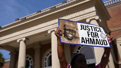 Ahmaud Arbery's family accuse DOJ of "betrayal" after 2 of his killers strike plea deal