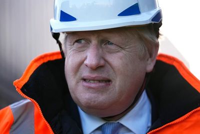 Boris Johnson tries to change subject from 'partygate' woes