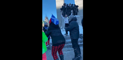Police launch investigation after member of Canada trucker convoy filmed dancing on tomb of unknown soldier