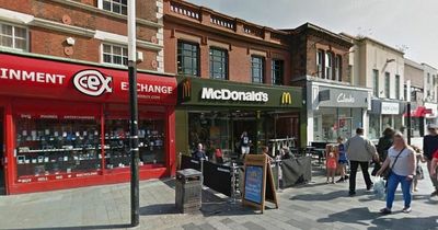 Teen arrested over assault after gang of 15 youths 'hang around' McDonald's