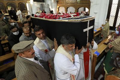 Priest's killing in Pakistan reignites fear in Christian community