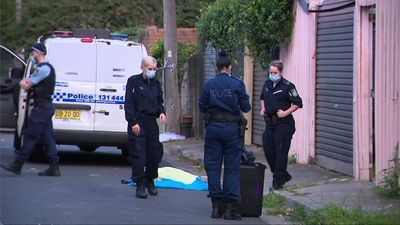 Man charged over alleged Redfern boarding house double murder to remain in custody