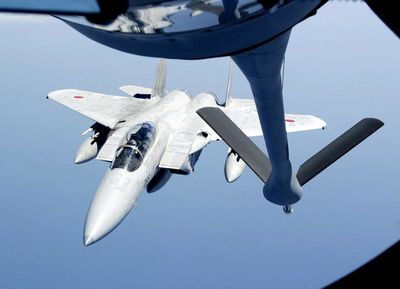 Japan says missing F-15 fighter probably crashed, crew missing