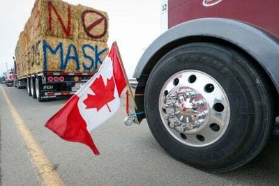 ‘Freedom Convoy’ protesters block Canada to US border crossing over vaccine mandates