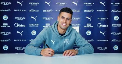 Joao Cancelo signs new Man City contract