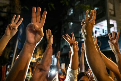 Myanmar protesters defy junta with strike and clapping protests on coup anniversary