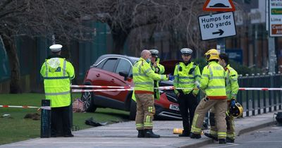 Police appeal for BMW drivers as woman fights for life after being hit by car