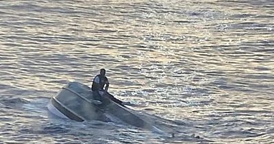 Boat disaster's sole survivor 'was face down on boat' when hero rescuers found him