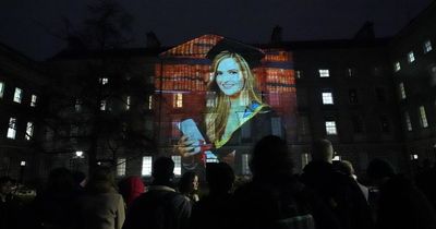 Trinity College lights up in stunning tribute to Ashling Murphy to mark St Brigid's Day