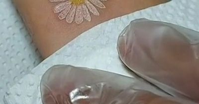 Woman gutted after getting 'cheap' tattoo that left her filled with regret