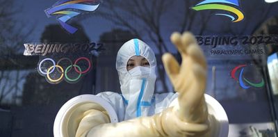 How will China handle the dual threats of COVID and political protests at the Winter Olympics?