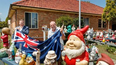 Jacko gets new flag to fly in his gnome-filled Belmont yard