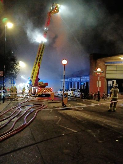 70 firefighters tackle blaze at car garage near Tube station