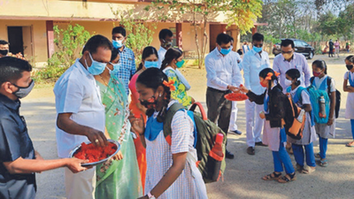 Roses greet students as schools reopen in Telangana