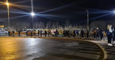 'Frightened' Scots NHS staff pictured queueing for buses home as car parks lie empty