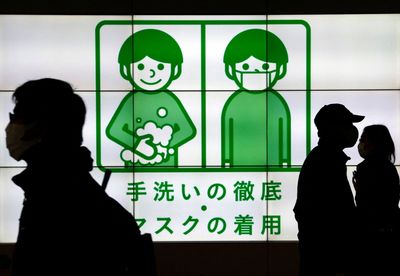 Tokyo's daily COVID-19 infections exceed 20,000 for first time