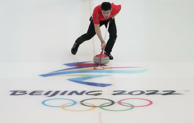 Olympics-Curling kicks off Beijing Games ahead of Putin-Xi main event