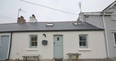 Transformation of traditional cottage near the sea into beautiful coastal home