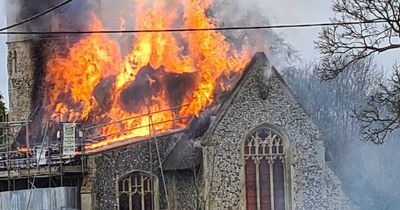 Huge fire rips through thatched roof of 11th century church just miles from Sandringham