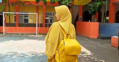 Woman so obsessed with colour yellow everything she owns is in the cheerful shade