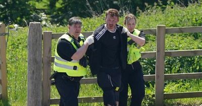 Dramatic moment murderer is arrested after stabbing ex-partner and autistic son