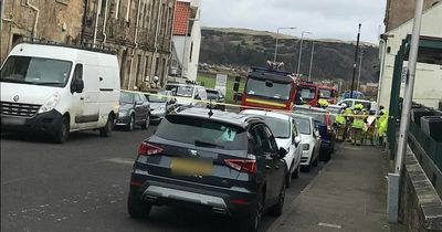 Fire crews in hazmat suits called to Scots building over 'strong chemical smell'