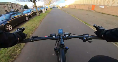 Watch as Edinburgh cyclist records near miss with driver at open junction